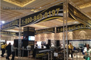 WIT Transmissions tall trade show display made with aluminum truss. Great for hanging banners and signs.