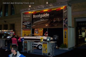 Boatguide trade show display made with aluminum trussing. Fantastic tall exhibit that stands out in a crowd. Boatguide aluminum truss convention hall display booth.