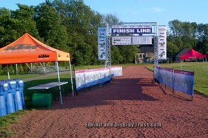 The feel of running through a professional looking finish line with sponsorship banners flying in the air. Banners and signage for race sponsors is always a big part of any race event or racing marathon. Race directors take note. Always buy is you can afford it.